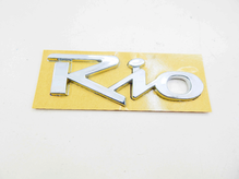 Эмблема RIO (надпись) на скотче ХРОМ 119х42мм ПХ 173.33